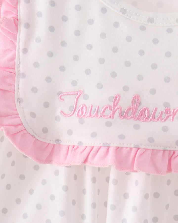White dress with pink ruffled collar and pink embroidered &