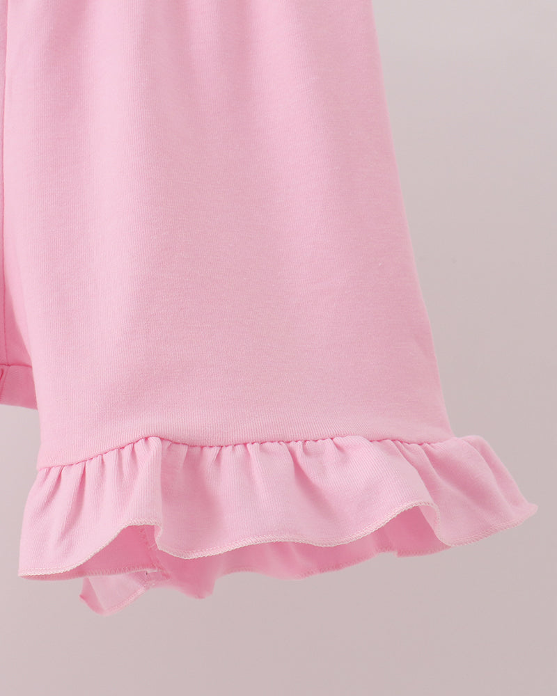 Pink ruffle hem shorts with elastic waistband