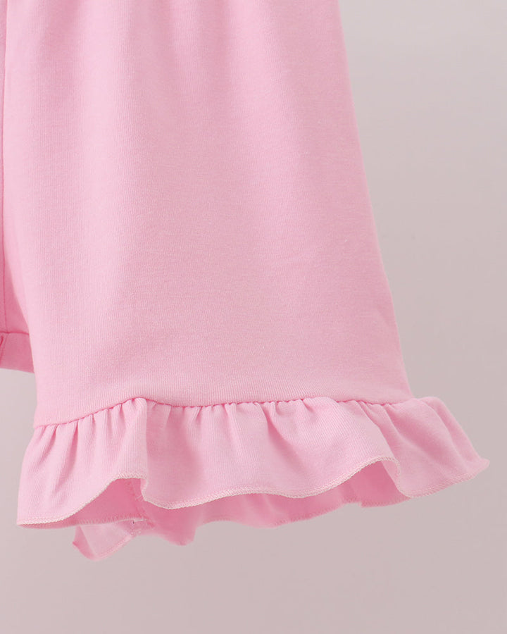 Pink ruffle hem shorts with elastic waistband