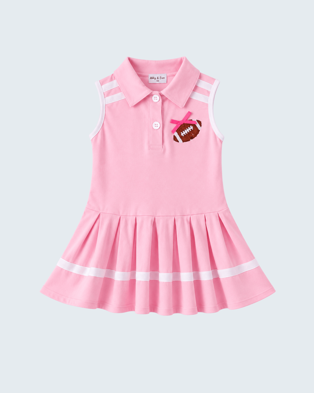 Pink sleeveless polo dress with football sequin patch and pleated hem