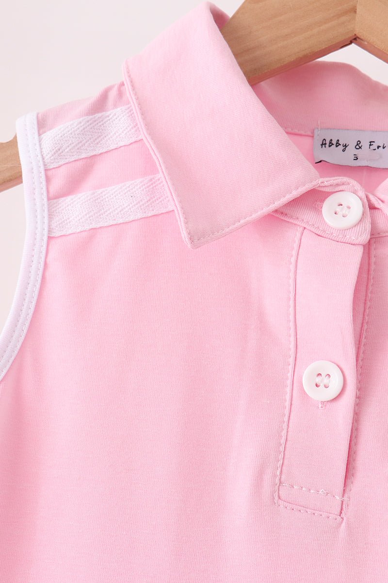 Pink sleeveless dress with buttoned polo collar and bow tab