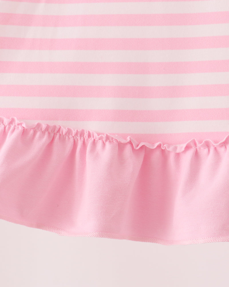 Pink-and-white striped dress with gathered pink ruffle hem