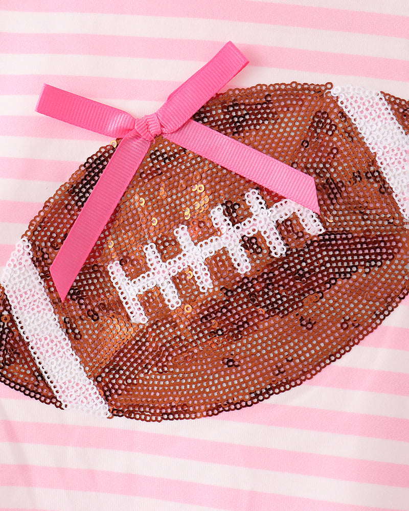 Pink sequin football applique with white stripes and pink ribbon bow on top