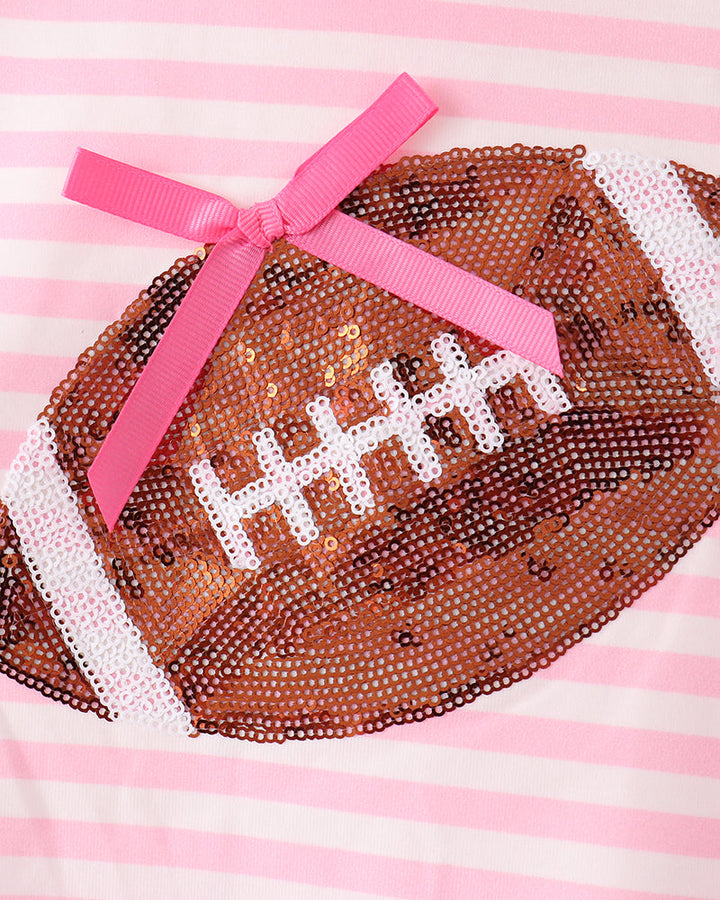 Pink sequin football applique with white stripes and pink ribbon bow on top
