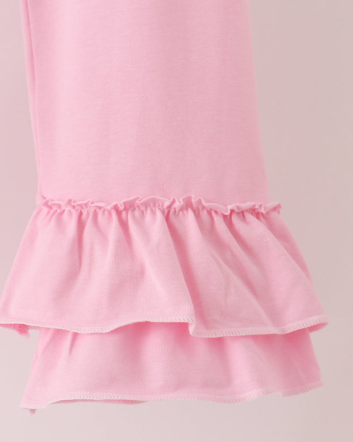 Pink ruffle pants with layered frill hem and elastic cuff