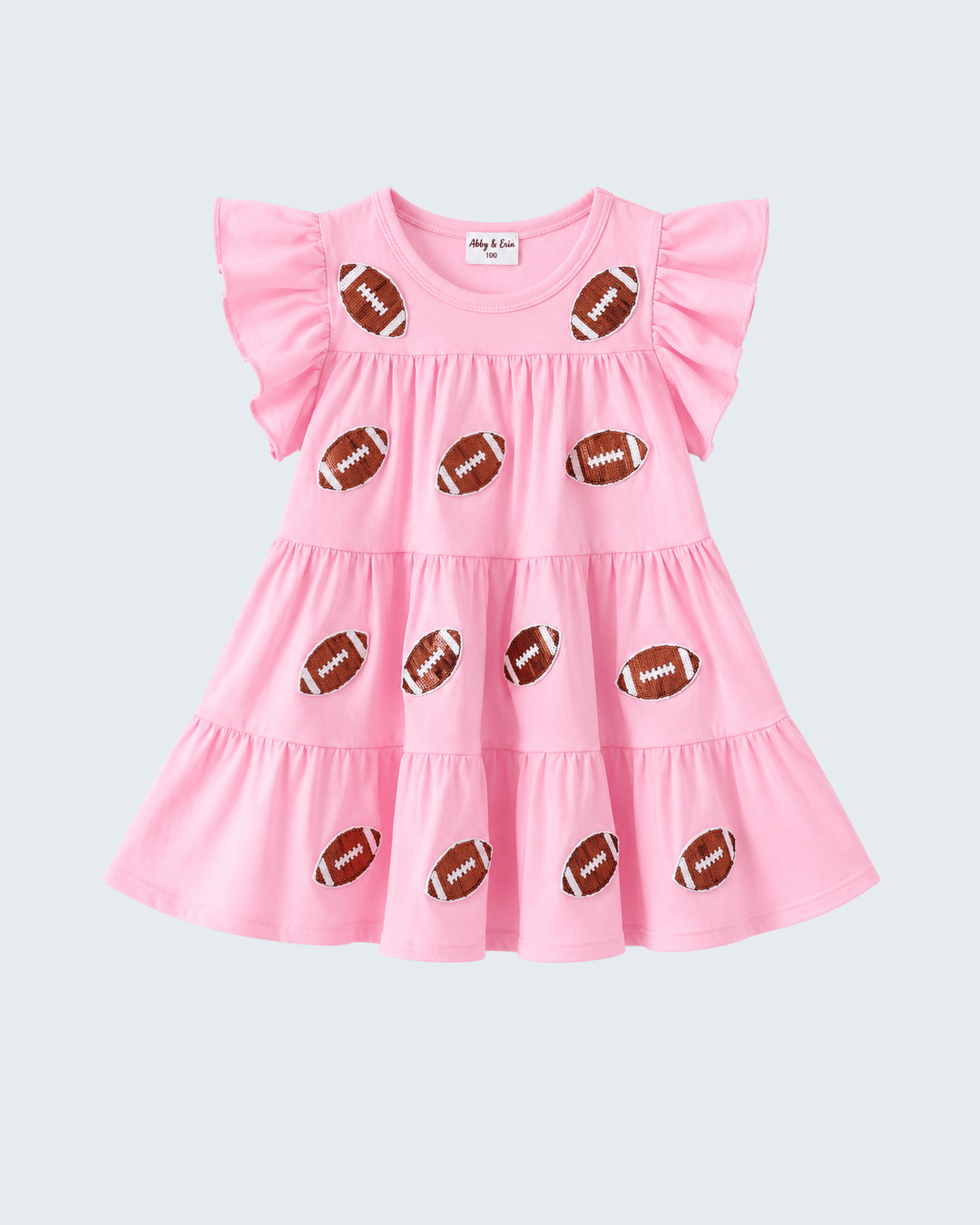 Pink tiered ruffle dress featuring scattered football sequin patches and flutter sleeves