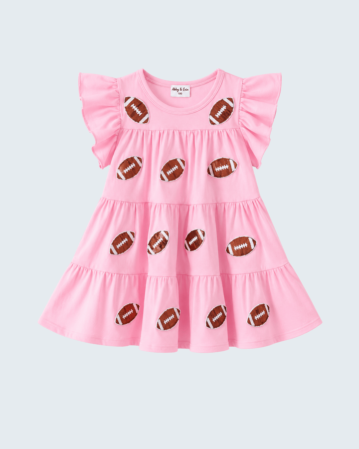 Pink tiered ruffle dress featuring scattered football sequin patches and flutter sleeves