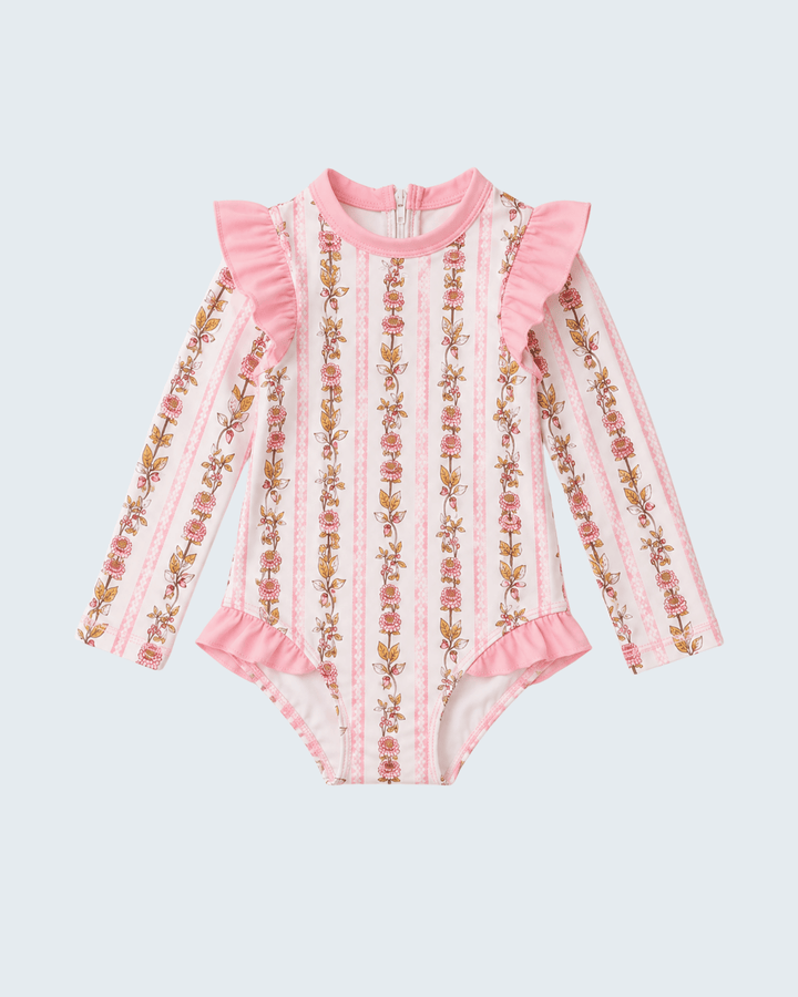 Pink Garden Ruffle Rashguard on light grey rashguard