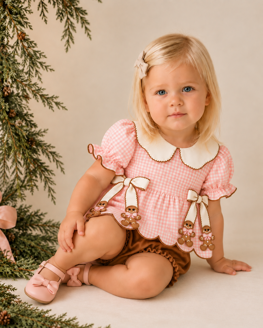 Pink gingham baby top with scalloped white collar and gingerbread appliques, with brown bloomer