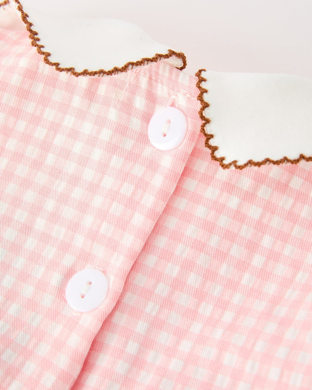 Girls pink gingham dress with white scalloped peter pan collar and button front