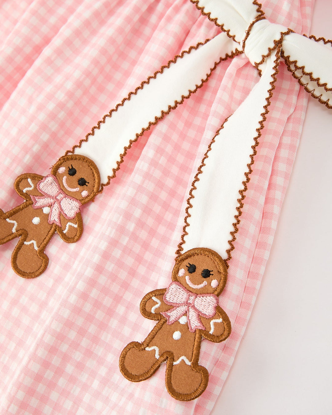 Girls pink gingham dress with gingerbread bear applique and white scalloped collar trim