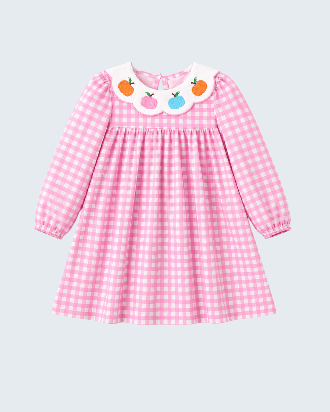A pink and white gingham long-sleeve dress for a toddler girl, featuring a white Peter Pan collar decorated with embroidered fruit motifs (apples and pears) on a light gray background.