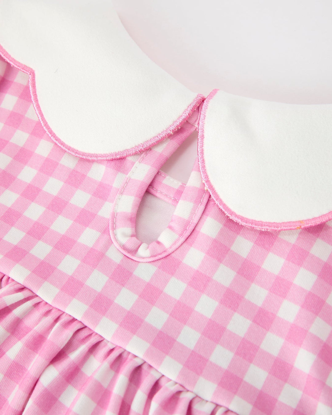 Girls pink gingham dress with scalloped rounded collar and pink trim
