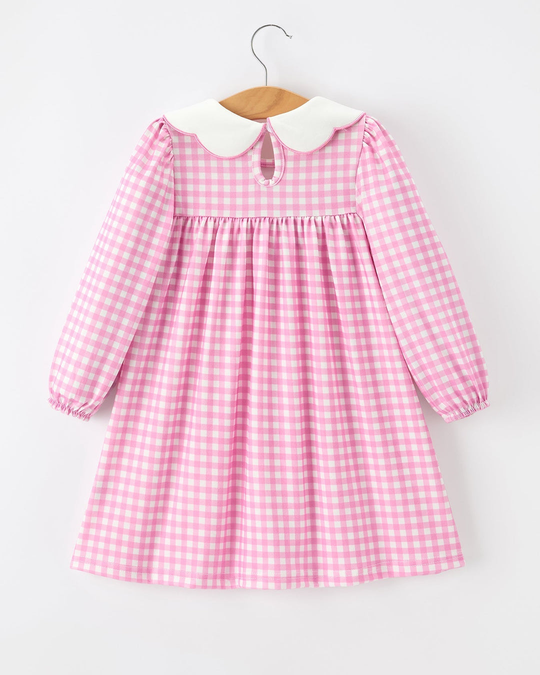 Girls pink gingham long-sleeve dress with keyhole button back