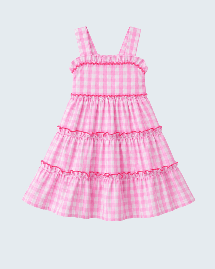 Pink checkered dress on a light purple background