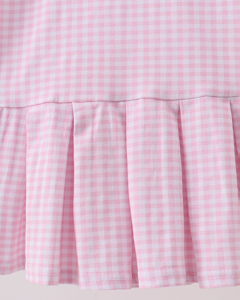 Pink gingham skirt section with gathered pleated ruffle hem
