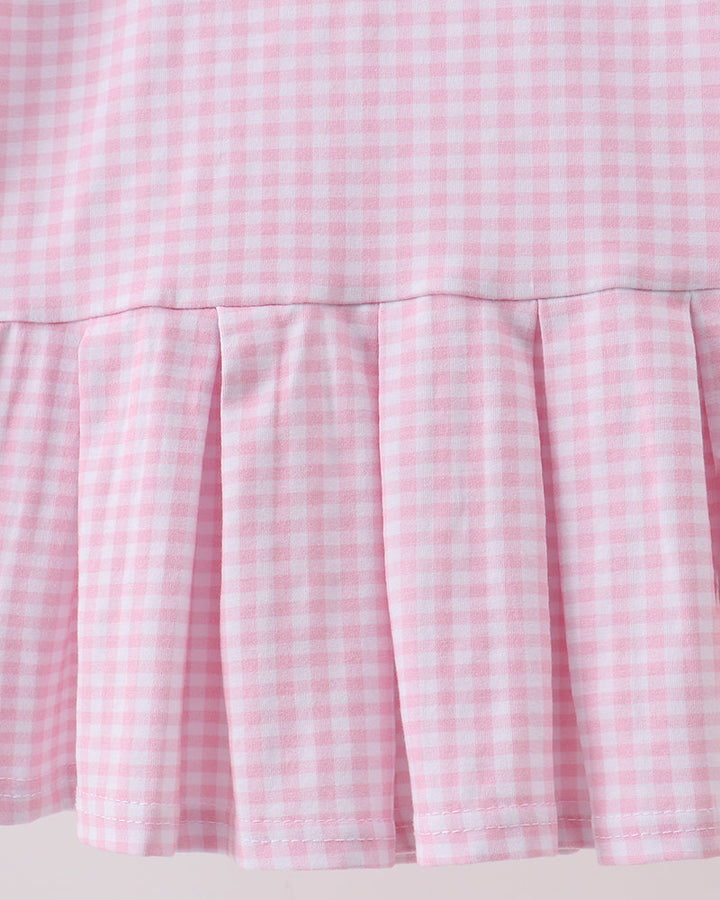 Pink gingham skirt section with gathered pleated ruffle hem