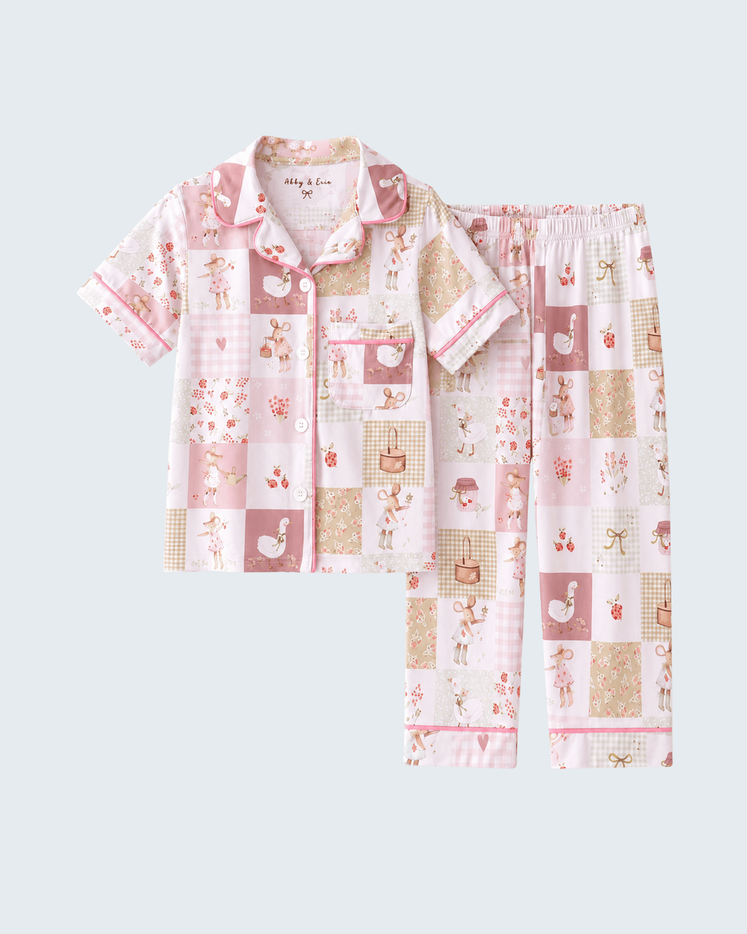Pink animal patchwork pajama set, short-sleeve button-up top and matching pants