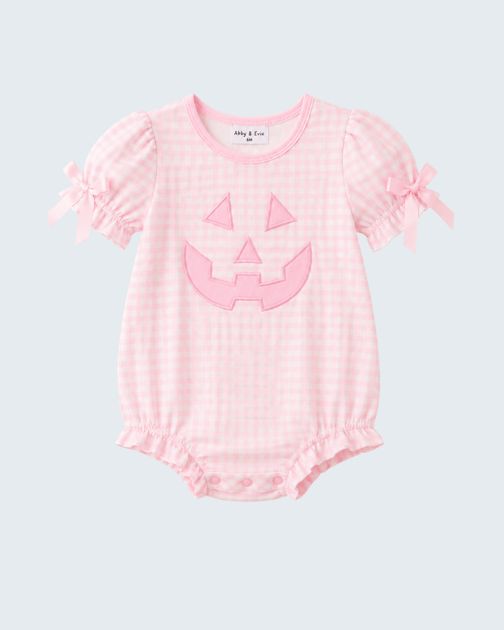 Pink gingham baby bubble romper with jack-o-lantern applique and bow tie sleeves