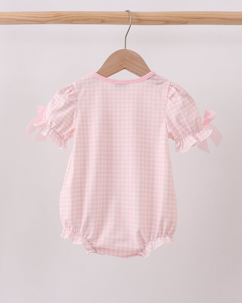 Pink gingham baby bubble romper with puff sleeves and back view with ruffled trim