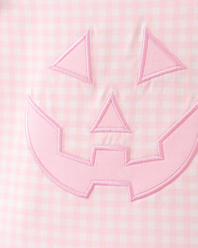 Pink gingham dress front with pink jack-o-lantern applique