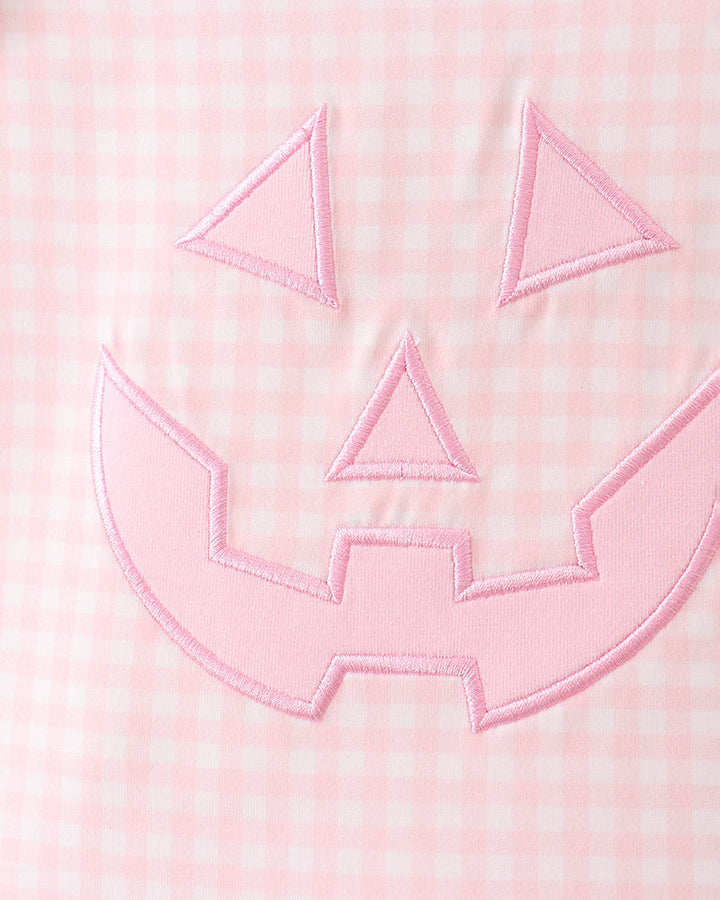 Pink gingham dress front with pink jack-o-lantern applique