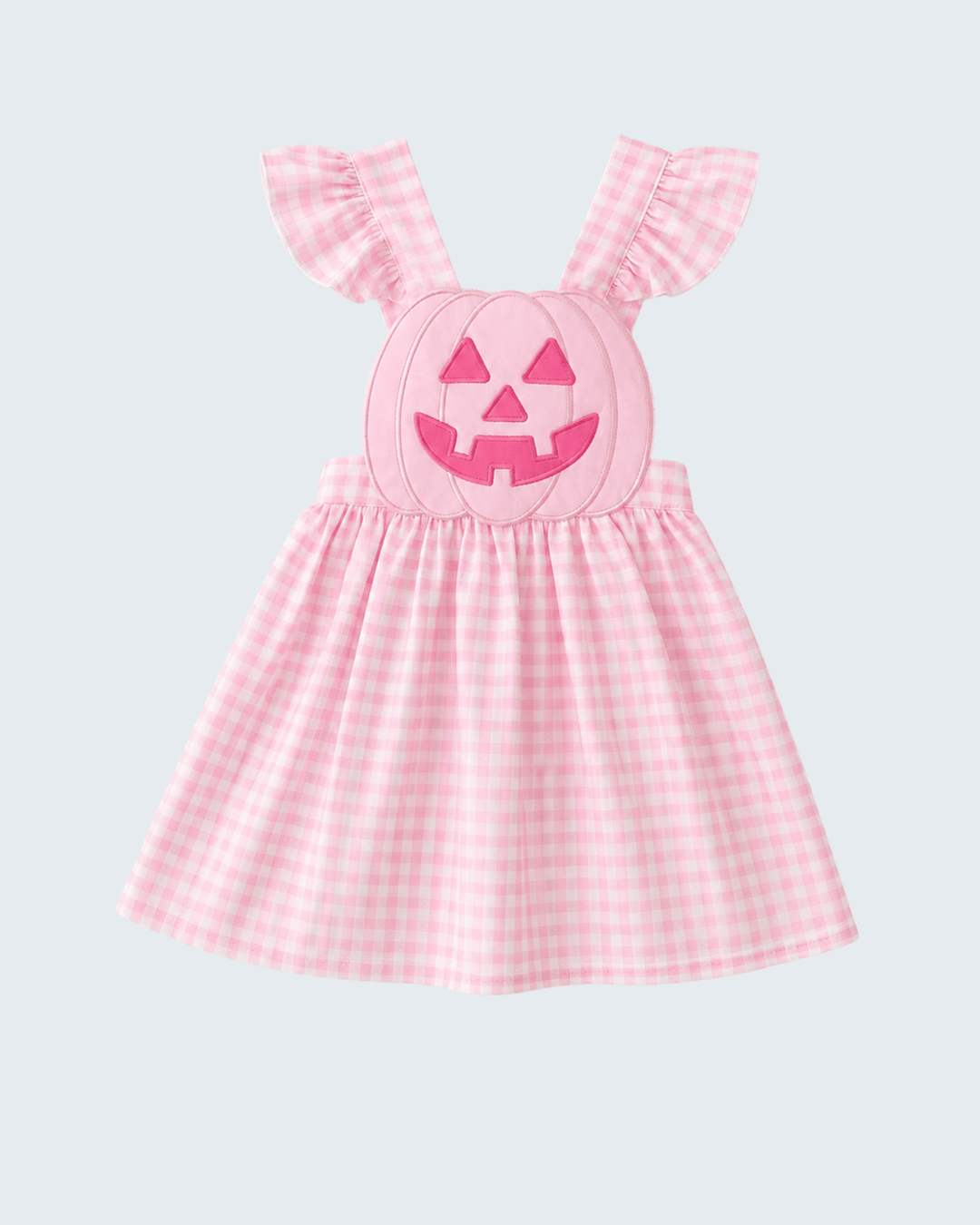 Pink gingham sleeveless ruffle dress with jack-o-lantern face applique