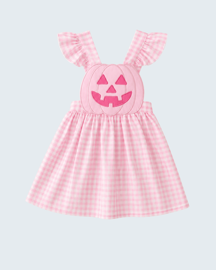 Pink gingham sleeveless ruffle dress with jack-o-lantern face applique