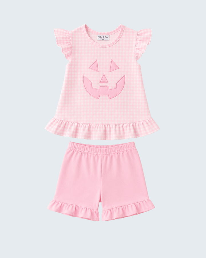 Pink gingham ruffle top and shorts set with jack-o-lantern applique
