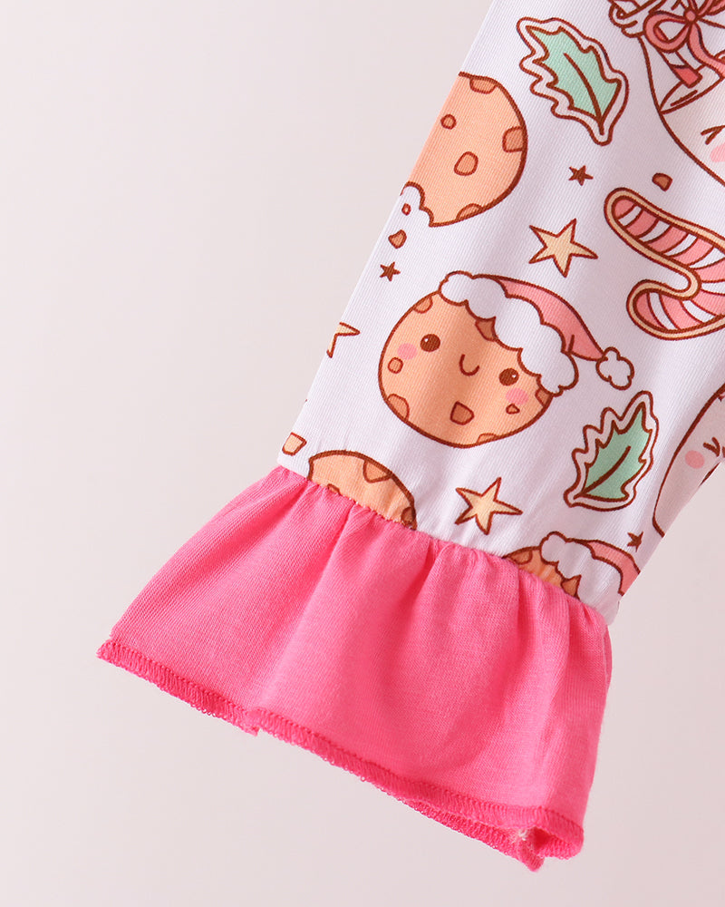 Cookie print pajama top sleeve with pink ruffle hem and elastic cuff.