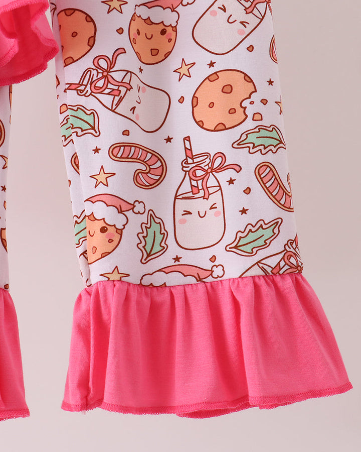 Cookie print pajama top with pink peplum-style ruffle hem.
