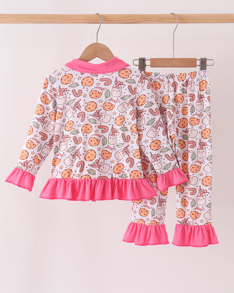 Cookie print long-sleeve pajama set with pink ruffled cuffs and matching pant legs.