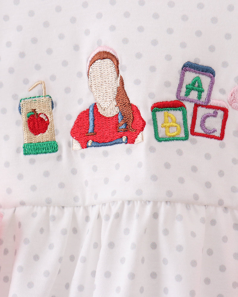 Pink dot baby bubble romper with ABC block embroidery and doll applique