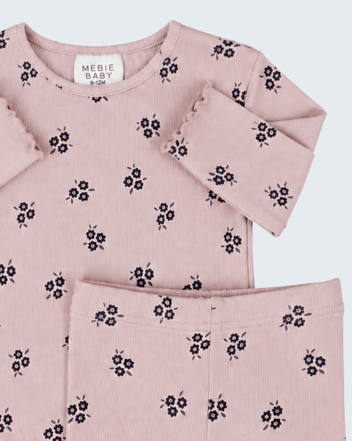 Pink cotton long-sleeve top and pants set with small dark floral pattern