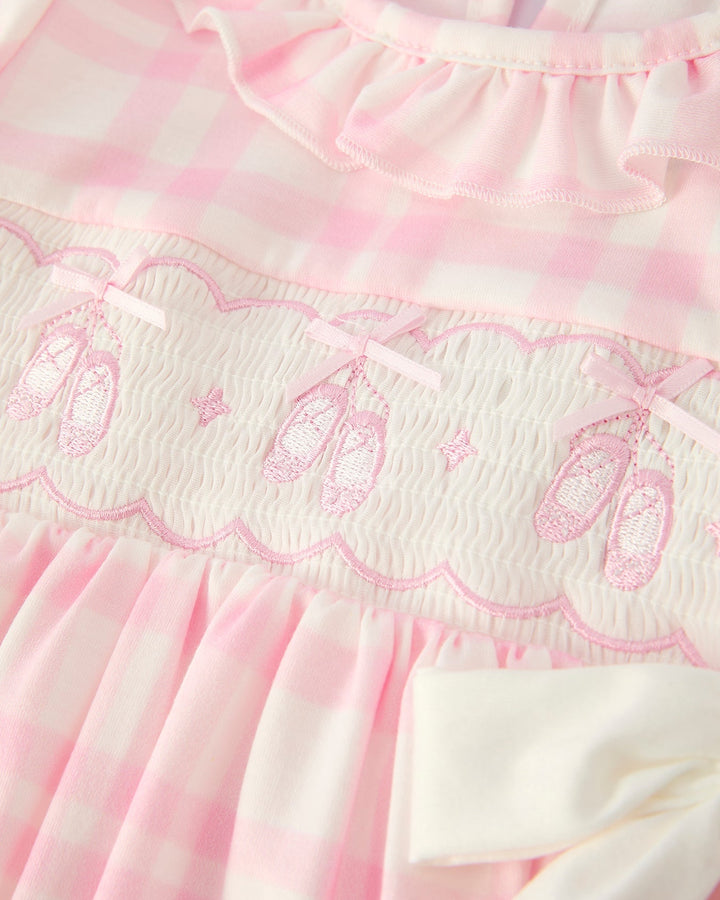 Pink plaid dress bodice with smocked embroidery and scalloped ruffle trim