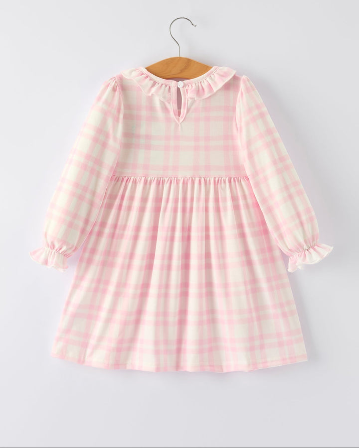 Back view of pink plaid long-sleeve dress with gathered waist and elastic cuffs