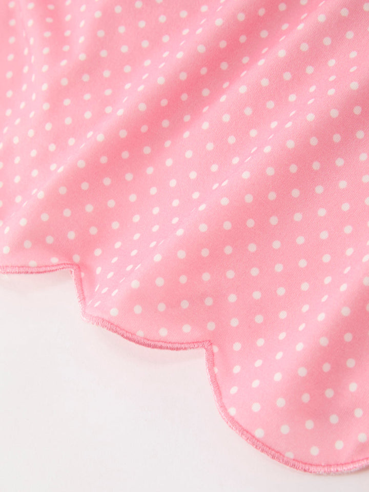 Pink polka dot skirt with scalloped ruffle hem and elastic sleeve trim