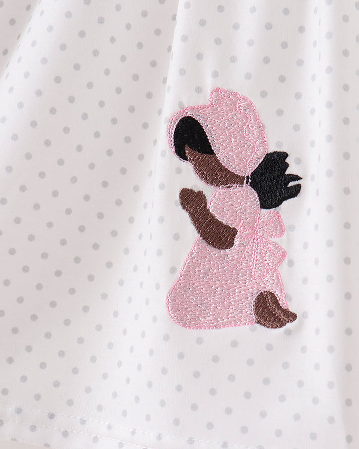White polka-dot dress with pink glitter praying girl applique