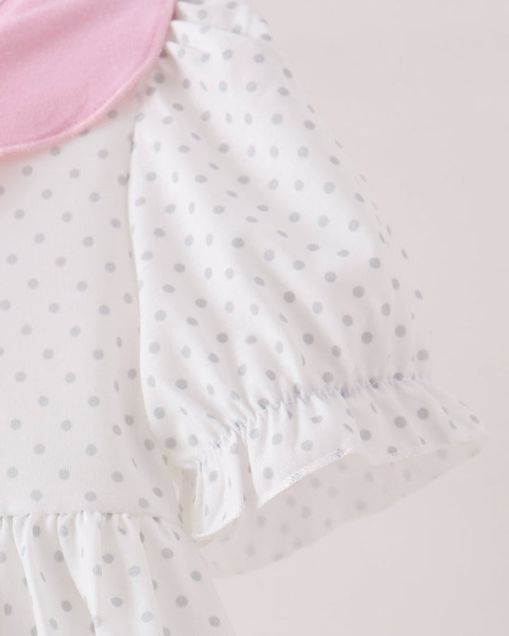 Short-sleeve white polka-dot dress with gathered waist and layered ruffles