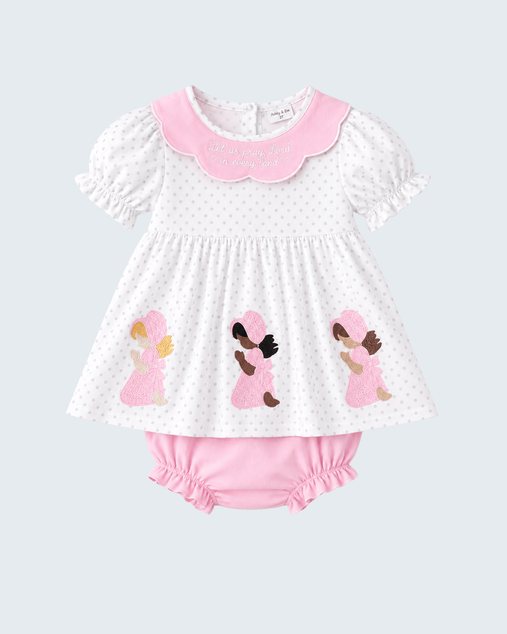 White dotted dress with pink scalloped collar, embroidered angels; matching pink bloomer