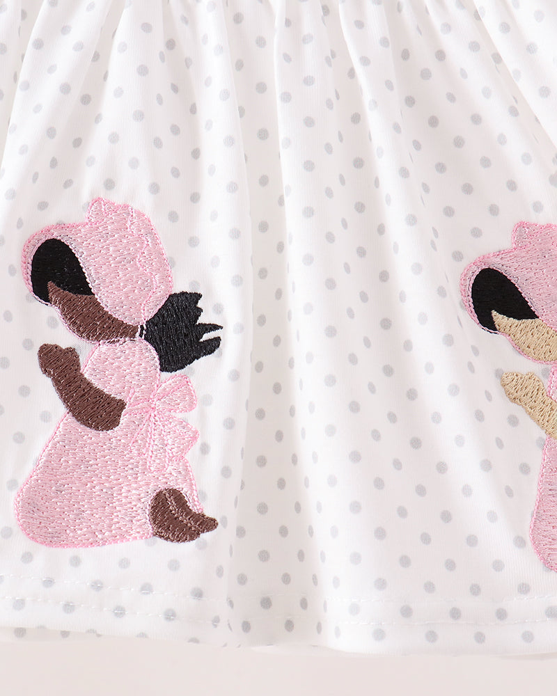 White dotted dress with pink embroidered angel appliques
