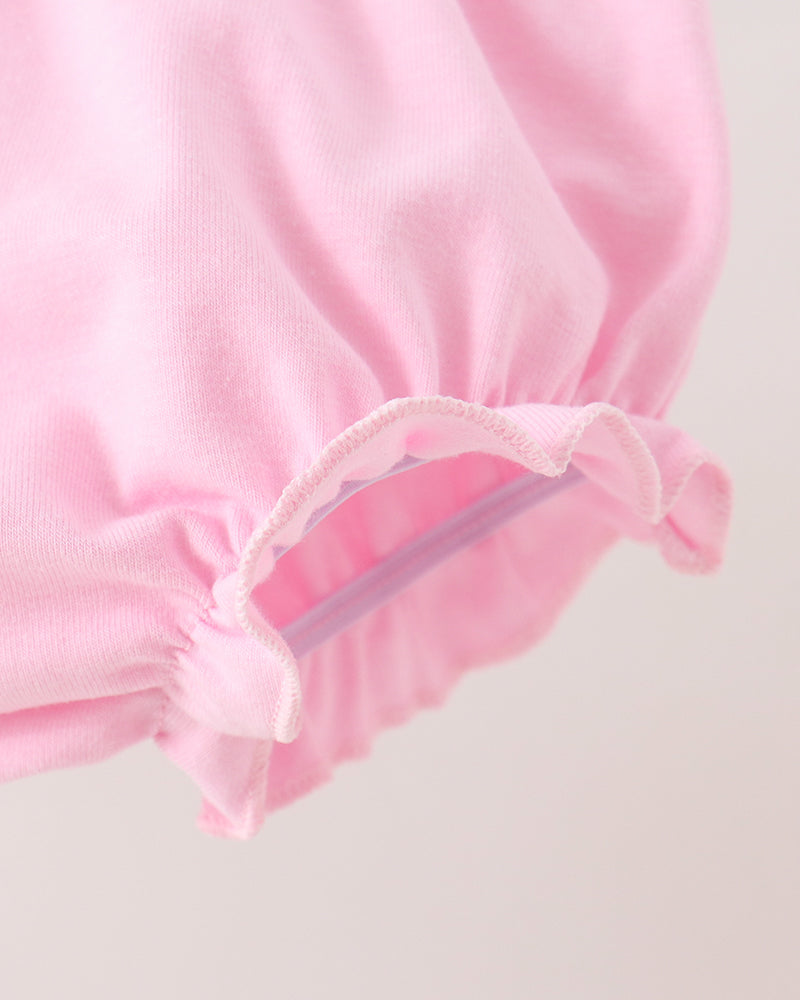 Pink ruffle-trim bloomer shorts with elastic waistband