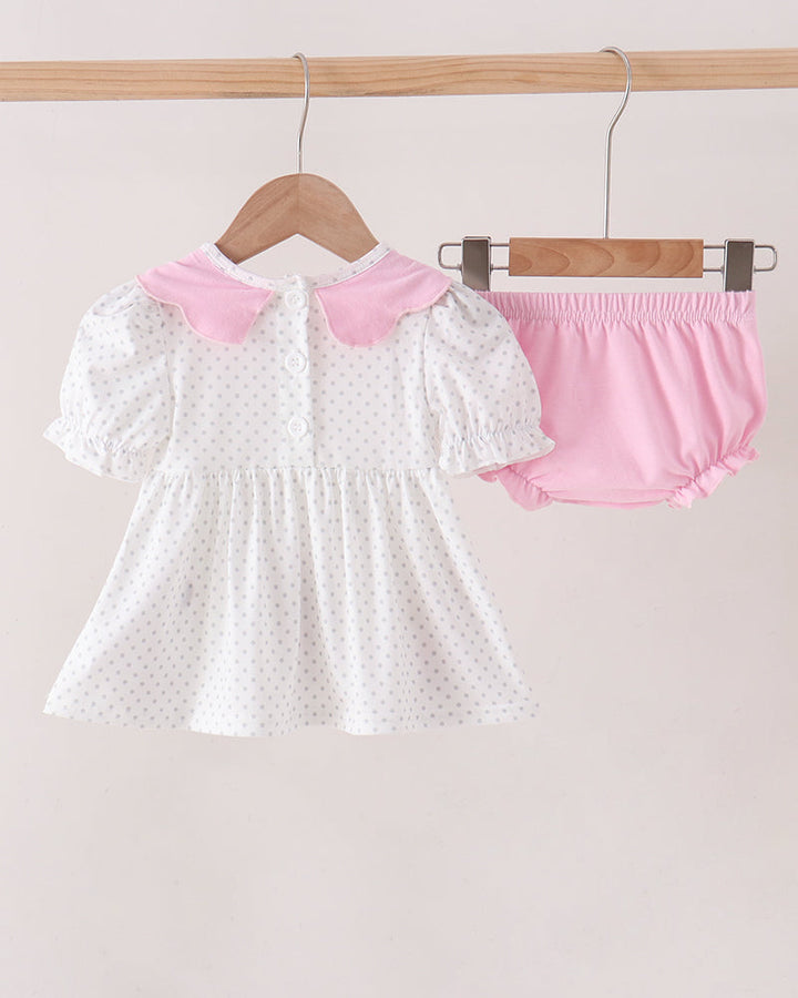 Girls dress and pink bloomer set on hangers, white with pink collar and dots