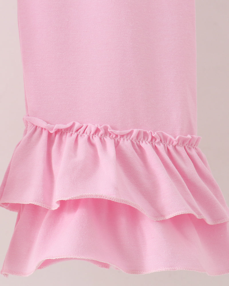 Pink ruffle pant waist with tiered peplum-style hem and soft gathered elastic