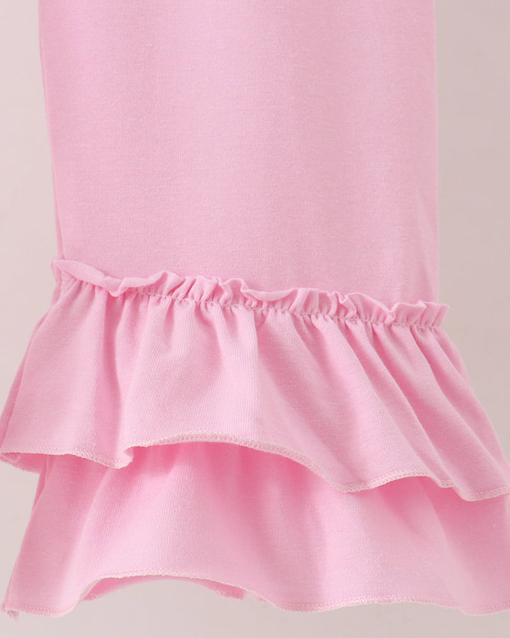 Pink ruffle pant waist with tiered peplum-style hem and soft gathered elastic