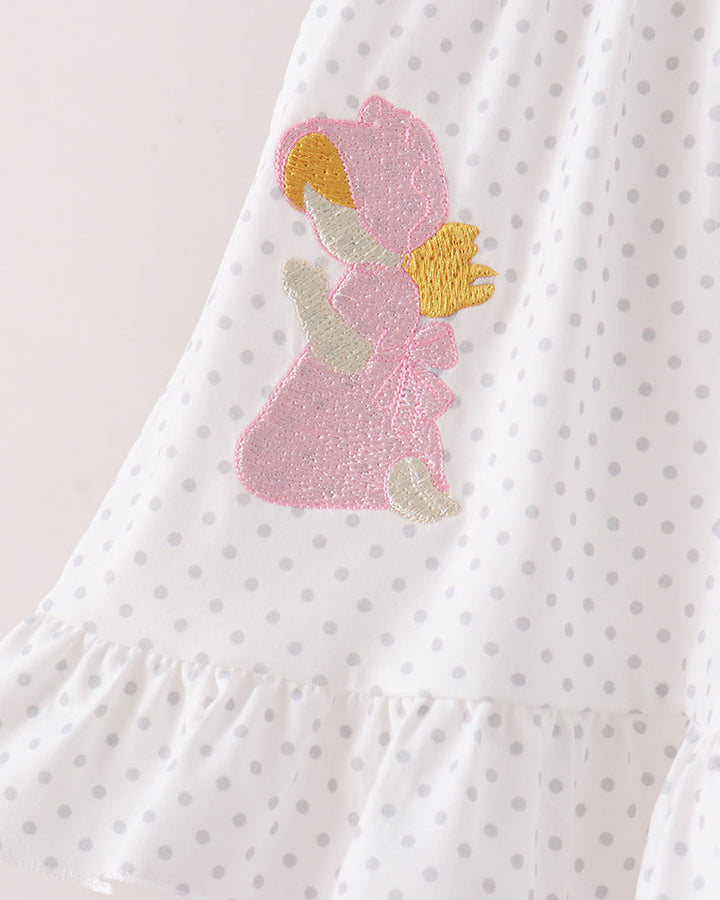 Ruffle pants from a pink prayer set with white polka dots and pink-gold embroidery