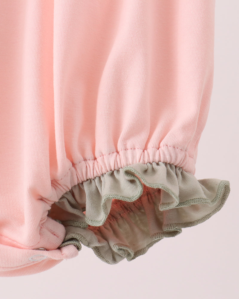 Pink bubble romper sleeve cuff with gathered gray-green ruffle