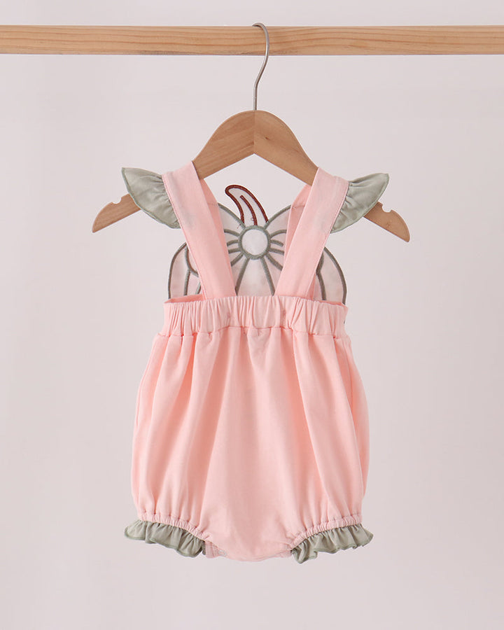 Pink baby bubble romper with ruffle hem and bow-appliqué straps