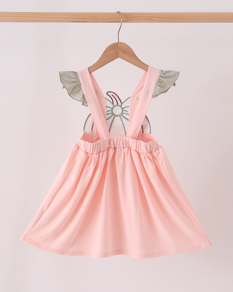 Pink ruffle dress with cross-back straps and flutter sleeves