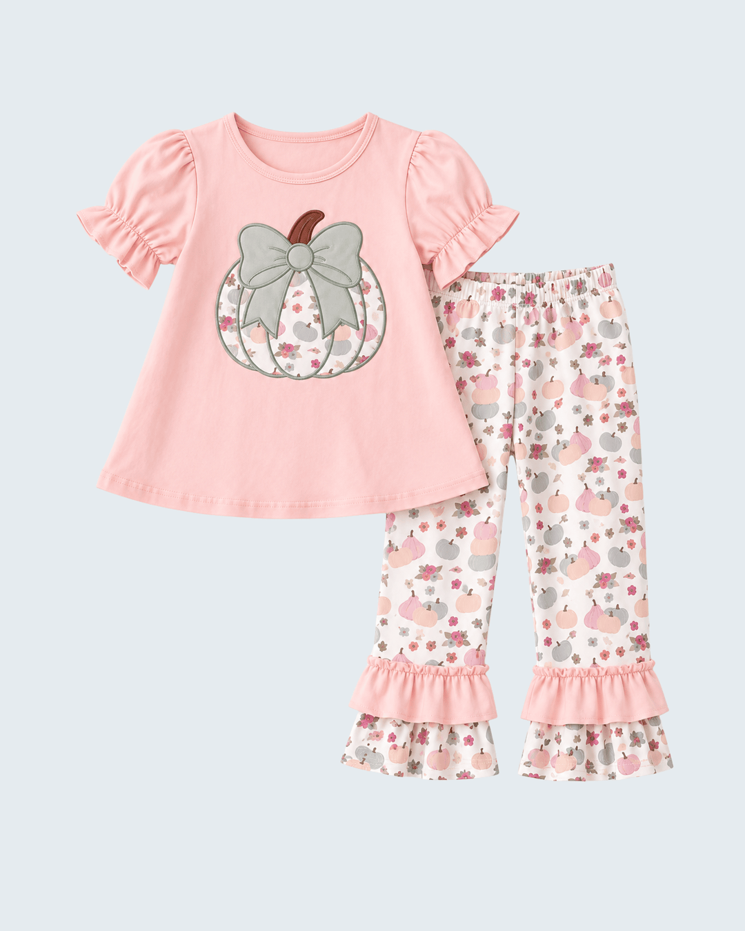Pink short-sleeve top with pumpkin bow appliqué and floral ruffle pants set